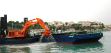 Backhoe Dredger with 3 spud & flat top barge and tugboat